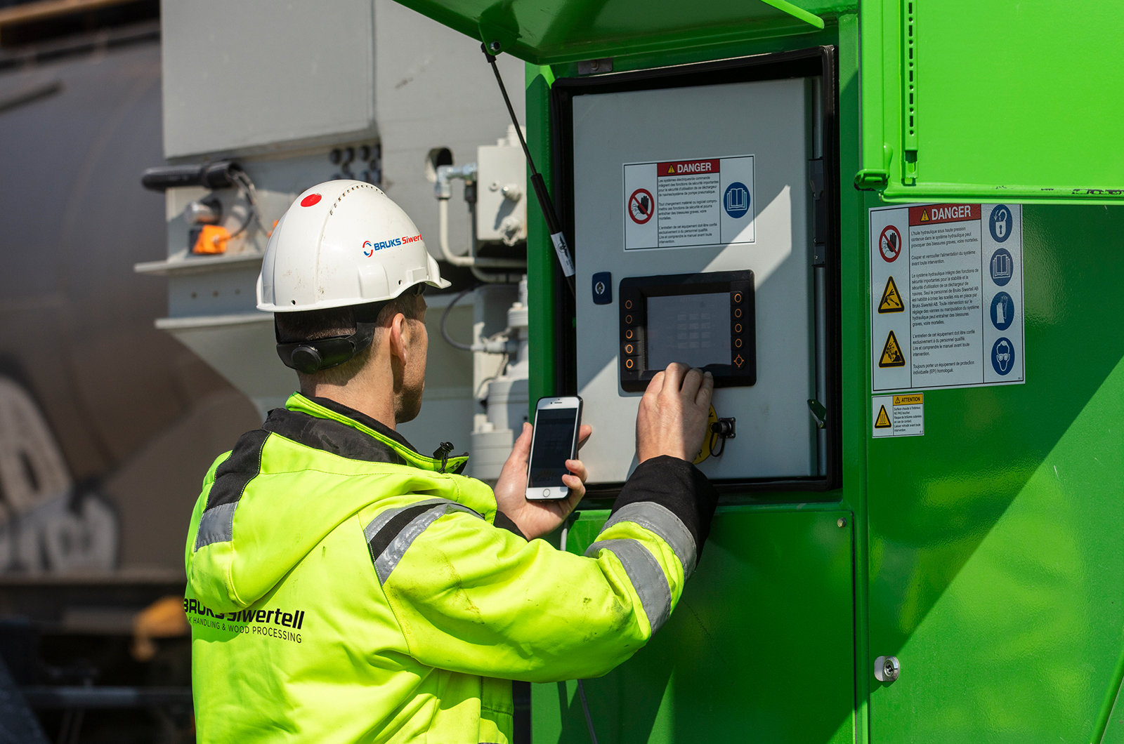 Man inspecting machine