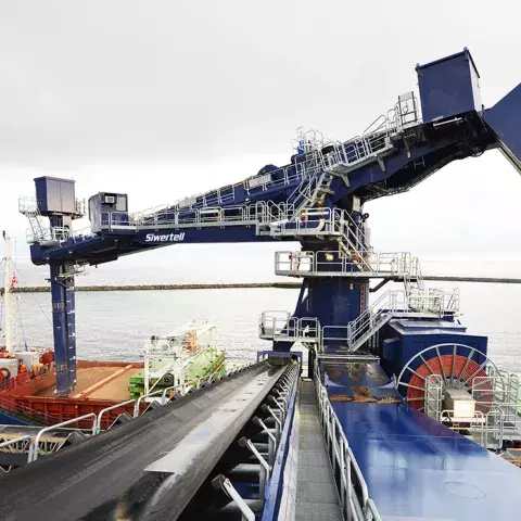 Blue Siwertell Ship unloader in operation