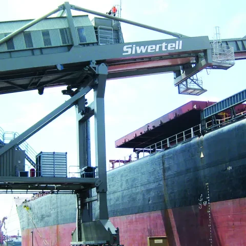 Grey Siwertell Ship loader in operation Grey Siwertell Ship loader in operation