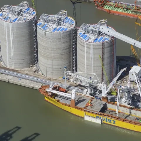 Two Siwertell ship unloaders at Gladstone dock, Liverpool, UK Two Siwertell ship unloaders at Gladstone dock, Liverpool, UK