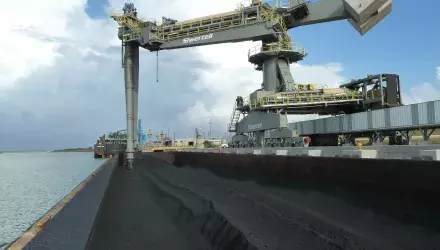 Siwertell ship unloader is unloading coal