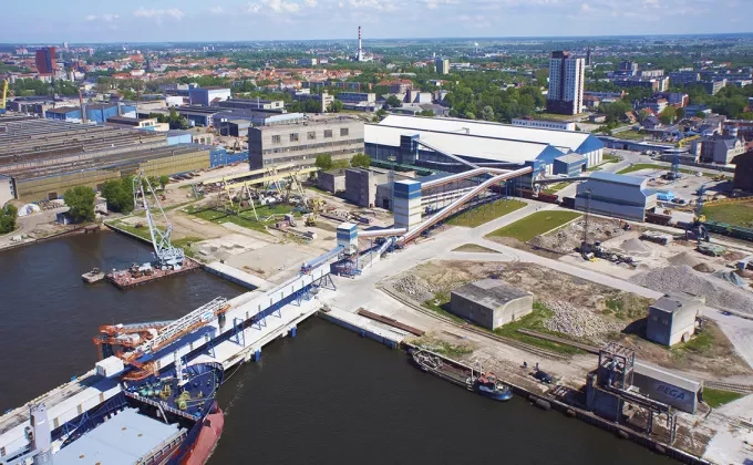 Siwertell bulk terminal with ship loader and conveyors seen from above at Bega in Lithuania